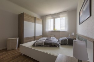 Schlafzimmer einer Musterwohnung am Kirschberg