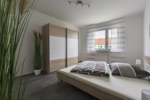Schlafzimmer einer Musterwohnung in der Reinhardtstraße