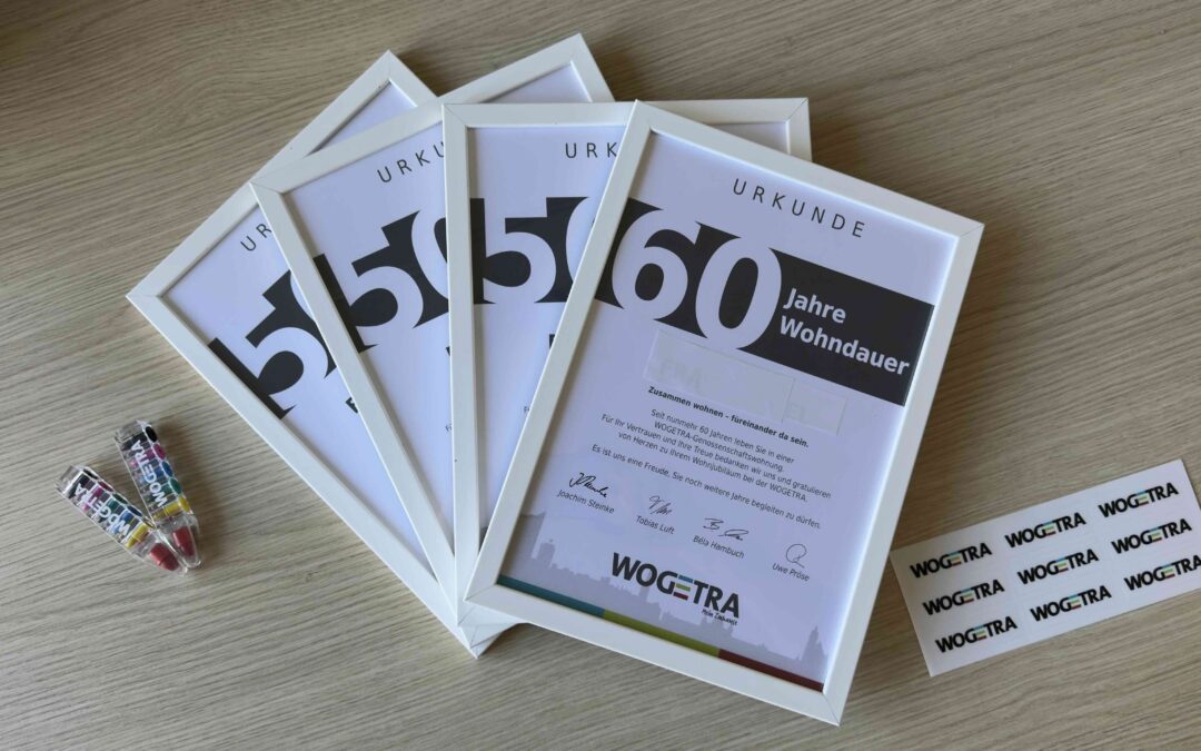 WOGETRA Wohndauerurkunden liegen auf dem Tisch